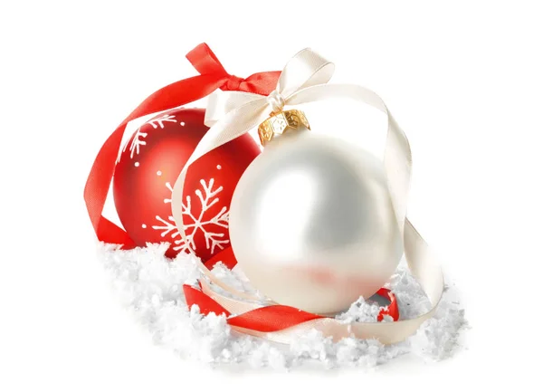 Beautiful Christmas balls with snow on white background — Stock Photo, Image