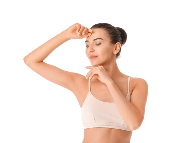 Hermosa mujer joven en ropa interior sobre fondo blanco — Foto de Stock