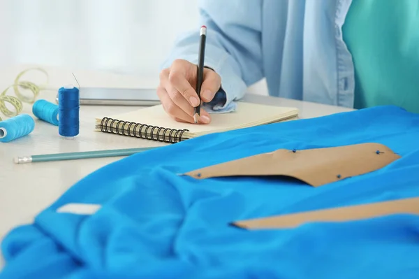 Female designer working in studio, closeup — Stock Photo, Image