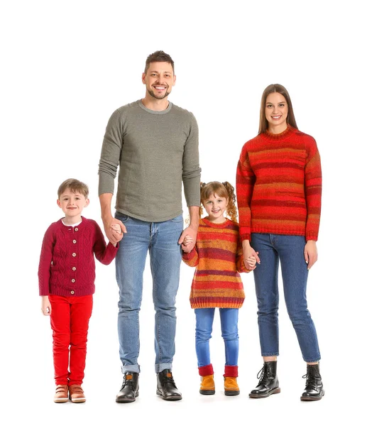Happy family in winter clothes on white background — Stock Photo, Image