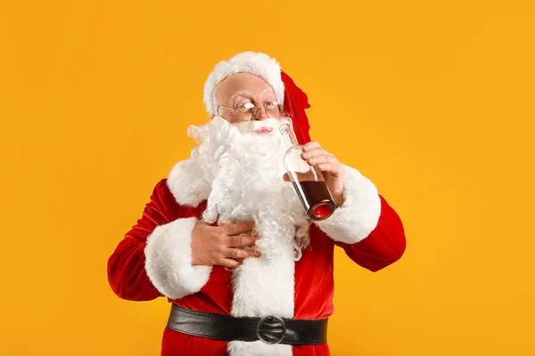 Funny drunk Santa Claus on color background — Stock Photo, Image