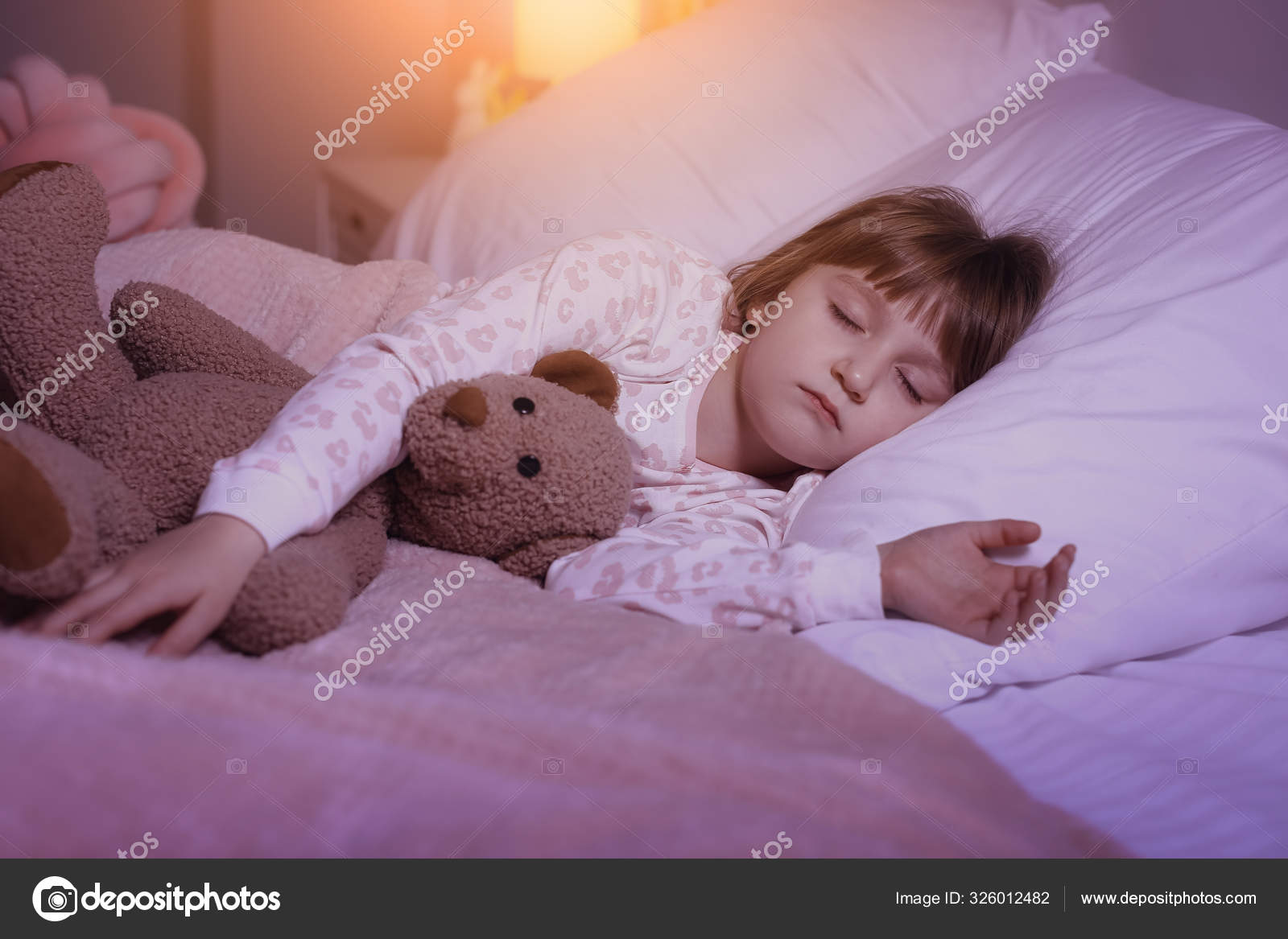 little girl sleep Adorable little girl sleeping in her bed Stock Photo