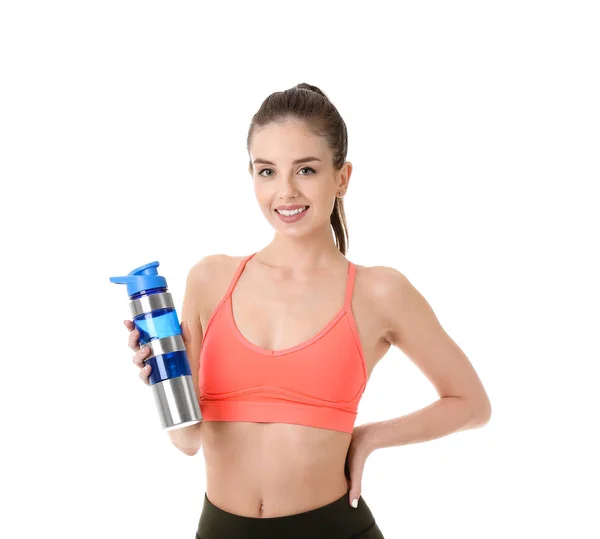 Sporty young woman with bottle of water on white background — Stock Photo, Image