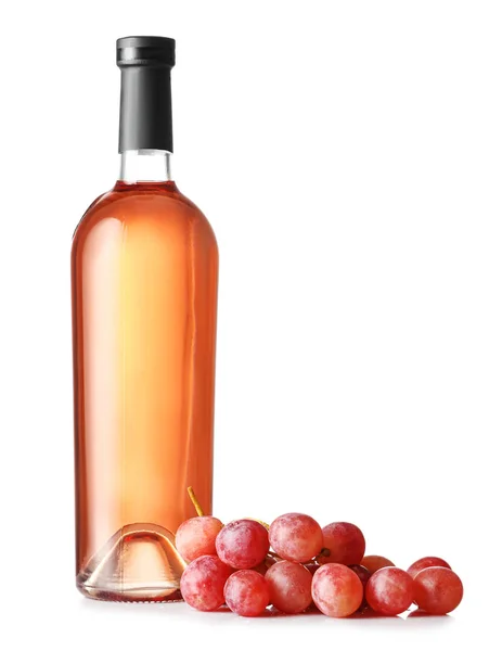 Bottle of wine and grapes on white background — Stock Photo, Image