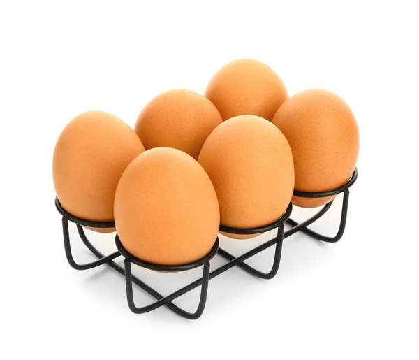 Hållare med färska ägg på vit bakgrund — Stockfoto