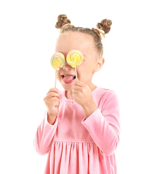 Cute little girl with sweet lollipops on white background — ストック写真