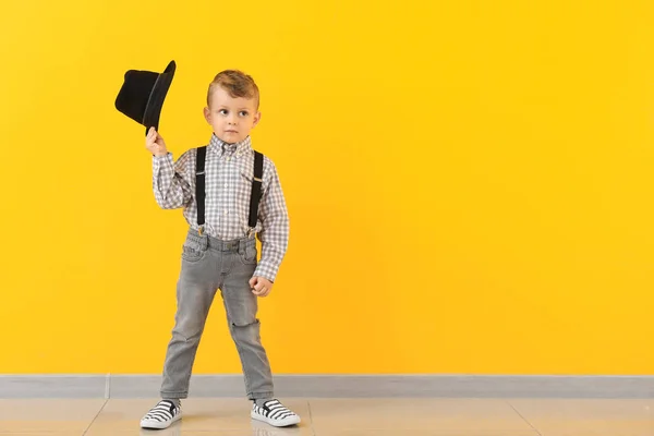 Portrait of stylish little boy against color wall — Stock Photo, Image