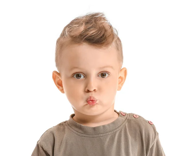 Porträtt av rolig liten pojke på vit bakgrund — Stockfoto