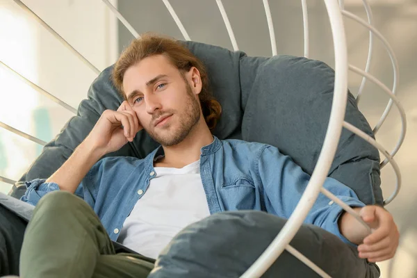 Handsome man resting at home — Stock Photo, Image