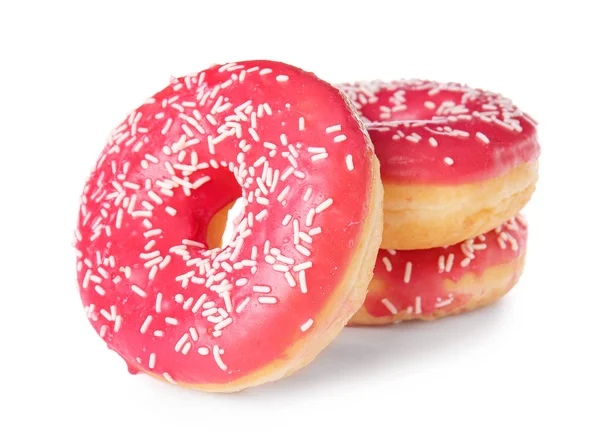 Sweet tasty donuts on white background — Stock Photo, Image
