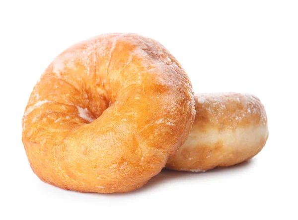 Doce saboroso donuts no fundo branco — Fotografia de Stock