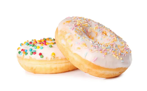 Doce saboroso donuts no fundo branco — Fotografia de Stock
