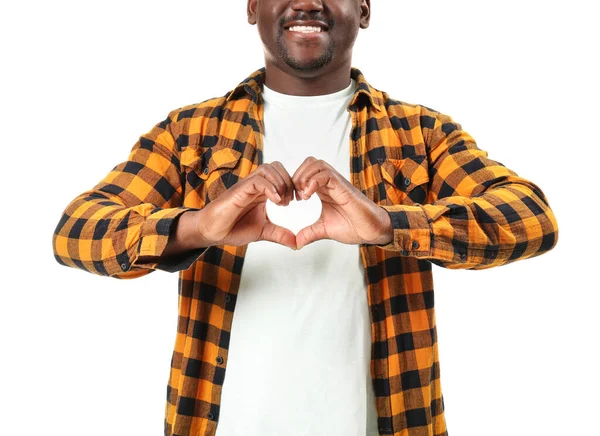 African-American man making heart with his hands on color background — Stock Photo, Image
