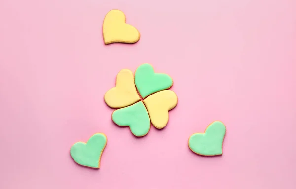 Heart shaped cookies for Valentine's day on color background