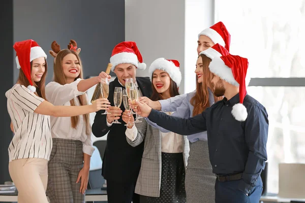 Colleagues at New Year party in office — Stock Photo, Image