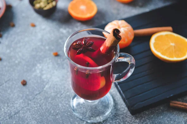 Glass cup of tasty mulled wine on table — Stock Photo, Image