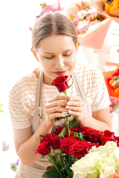 stock image Florist making beautiful bouquet in shop