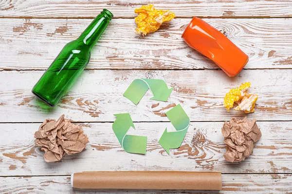 Different garbage on wooden background. Recycling concept — Stock Photo, Image