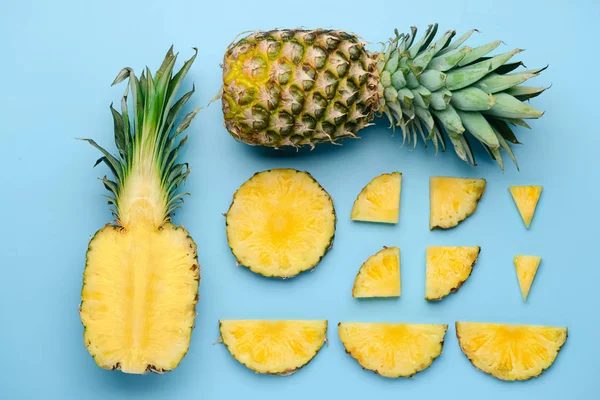Fresh ripe pineapples on color background — Stock Photo, Image