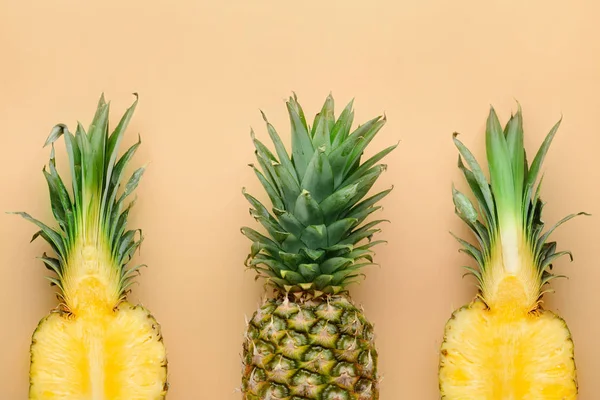 Fresh ripe pineapples on color background — Stock Photo, Image