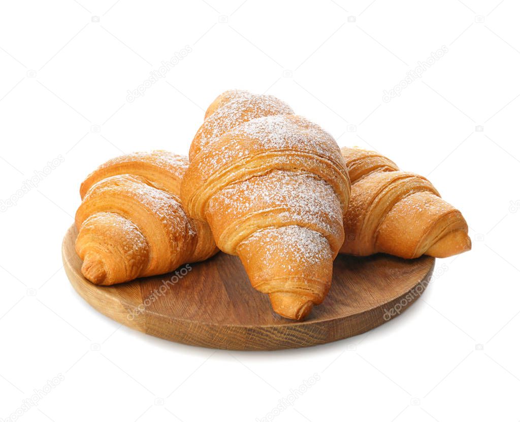 Tray with tasty croissants on white background