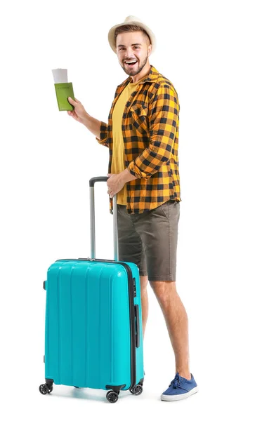 Молодий чоловік турист з багажем на білому тлі — стокове фото