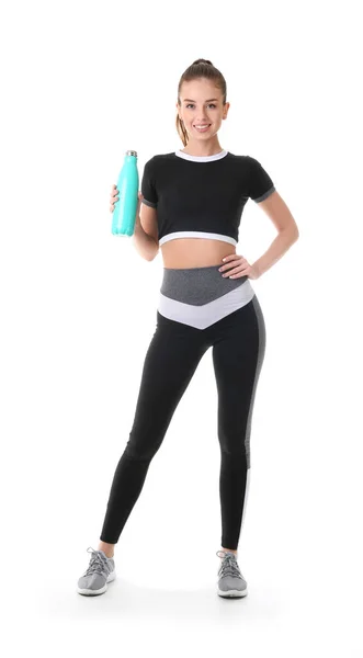 Sportliche junge Frau mit Wasserflasche auf weißem Hintergrund — Stockfoto