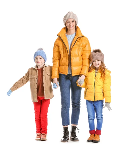 Happy family in winter clothes on white background — Stock Photo, Image