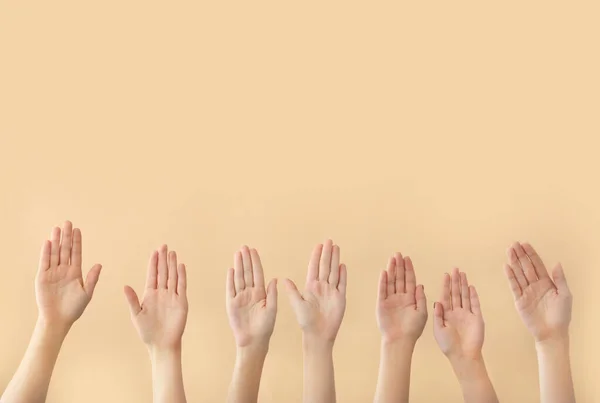 Hands of voting people on color background — Stock Photo, Image