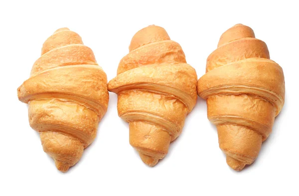 Croissants savoureux sur fond blanc — Photo