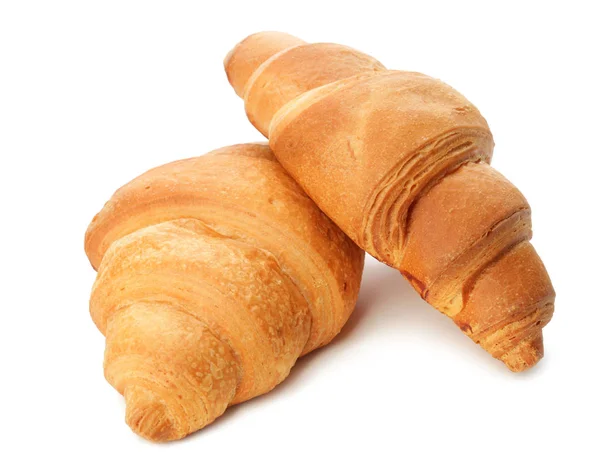 Croissants saborosos no fundo branco — Fotografia de Stock