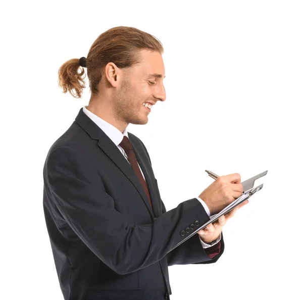 Male real estate agent with clipboard on white background — Stock Photo, Image