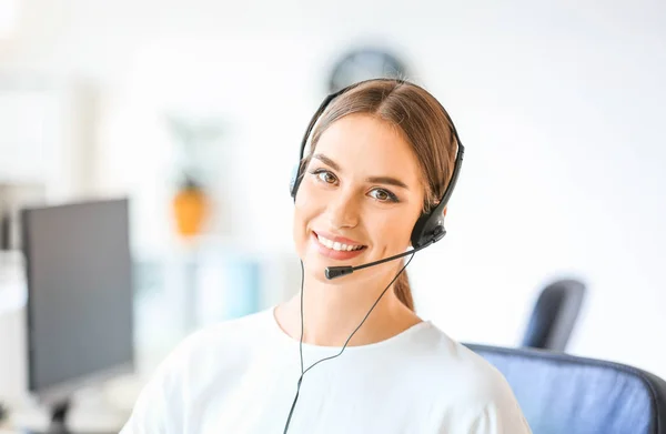 Female technical support agent working in office — Stock Photo, Image