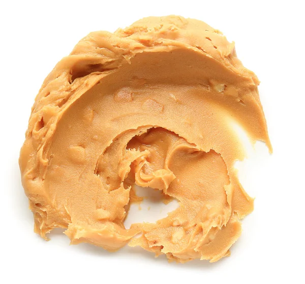 Вкусное арахисовое масло на белом фоне — стоковое фото
