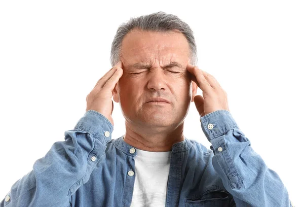 Mature man suffering from head ache on white background — Stock Photo, Image