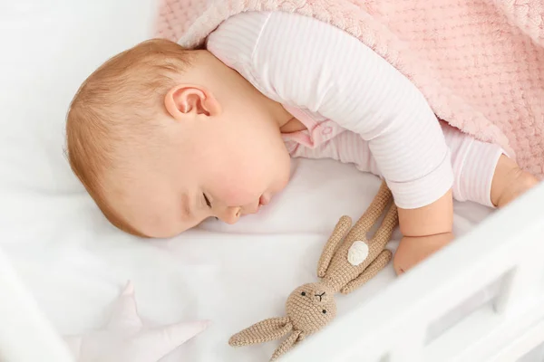 Cute sleeping little baby in bed — Stock Photo, Image