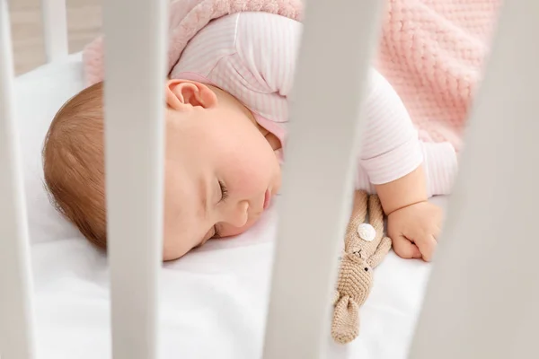 Cute sleeping little baby in bed — Stock Photo, Image