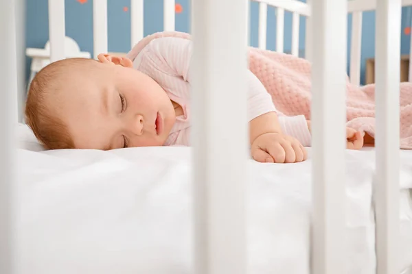 Cute sleeping little baby in bed — Stock Photo, Image