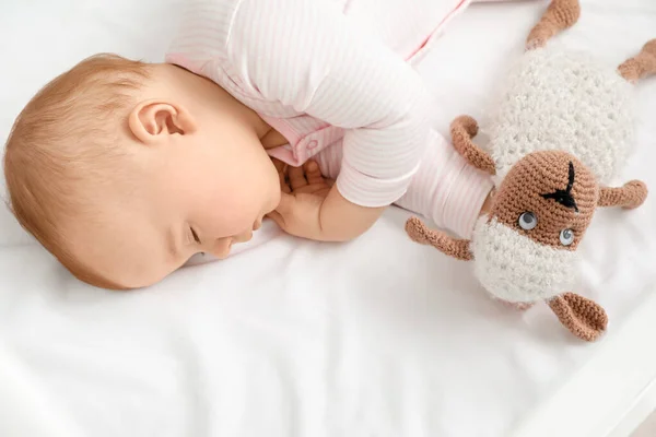 Cute sleeping little baby in bed — Stock Photo, Image