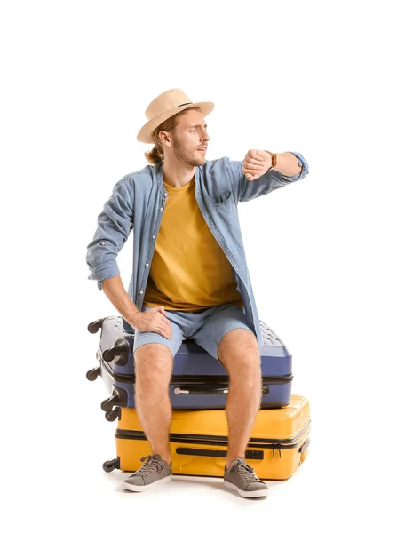 Joven turista con equipaje aislado en blanco —  Fotos de Stock