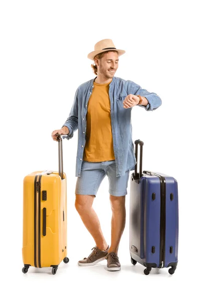 Giovane turista con bagagli isolati su bianco — Foto Stock