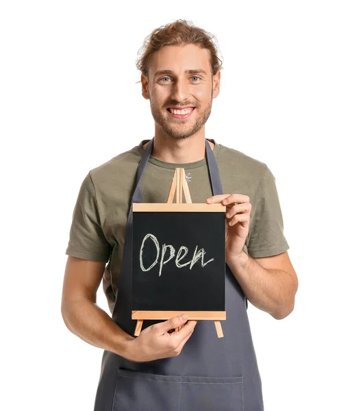 Masculino florista segurando quadro com texto ABERTO no fundo branco — Fotografia de Stock