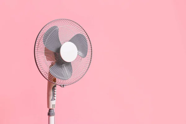 Electric fan on color background — Stock Photo, Image