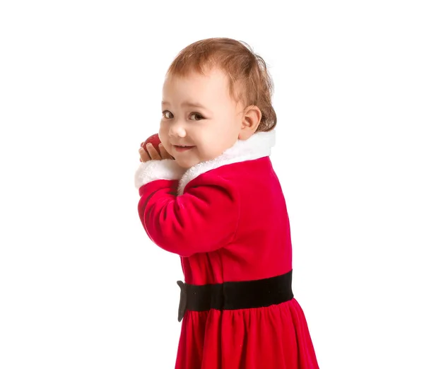 Cute little baby in Santa Claus costume and with Christmas ball on white background — Stock Photo, Image