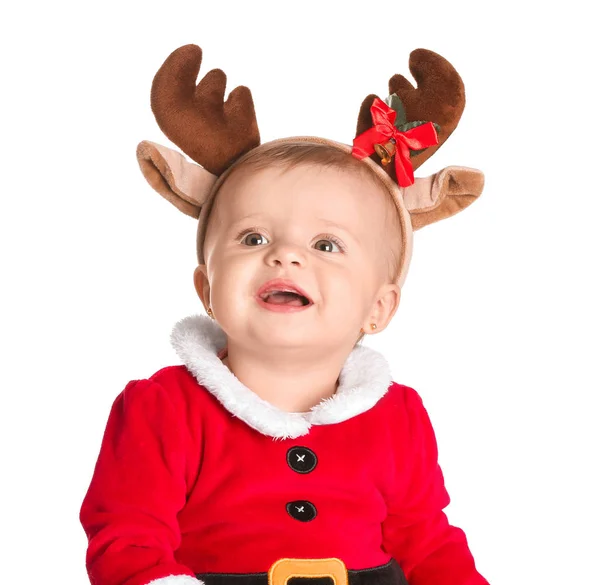 Cute little baby in Santa Claus costume and deer horns on white background — Stock Photo, Image