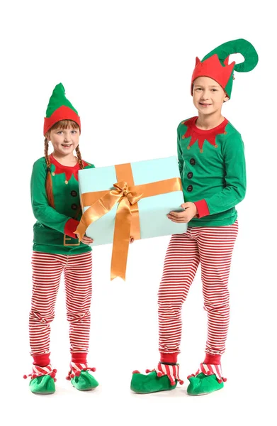 Little children in costume of elf and with gift on white background — Stock Photo, Image