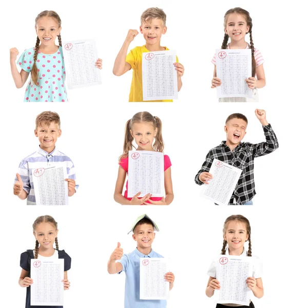 Glückliche Kinder mit Ergebnissen des Schultests auf weißem Hintergrund — Stockfoto