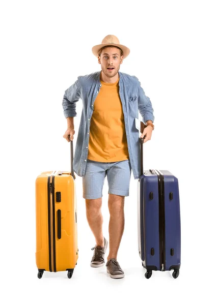 Young tourist with luggage isolated on white — Stock Photo, Image