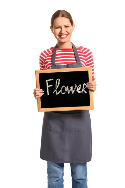 Portrait of female florist holding chalkboard with word FLOWER on white background — Stock Photo, Image