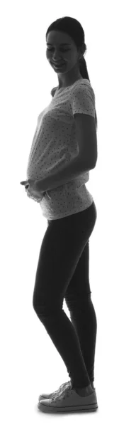 Silhouette av vakker, gravid kvinne på hvit bakgrunn – stockfoto